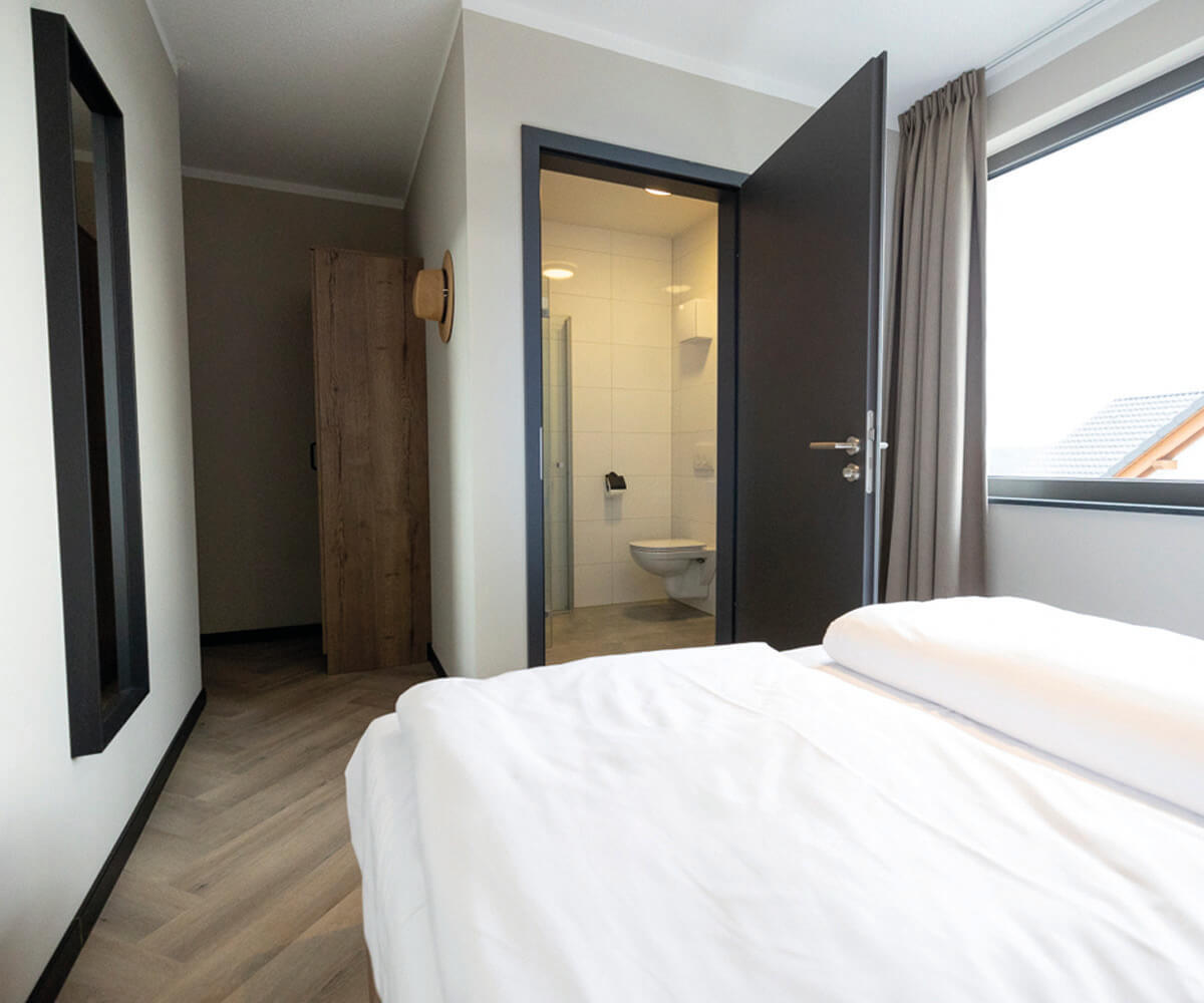 slaapkamer met toilet appartement neuastenberg